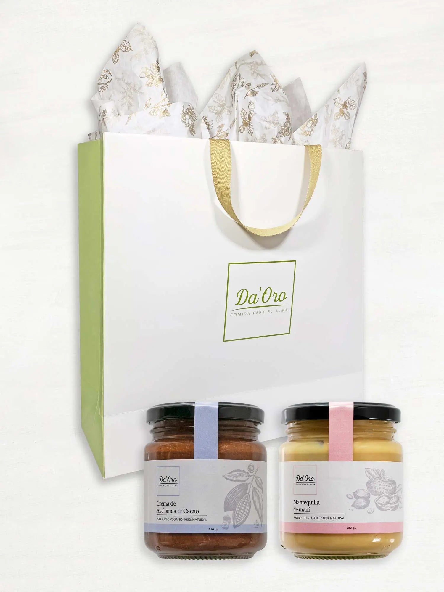 Bolsa de regalo marca Da'Oro con un frasco con mantequilla de maní y otro con nutella de 250 gramos