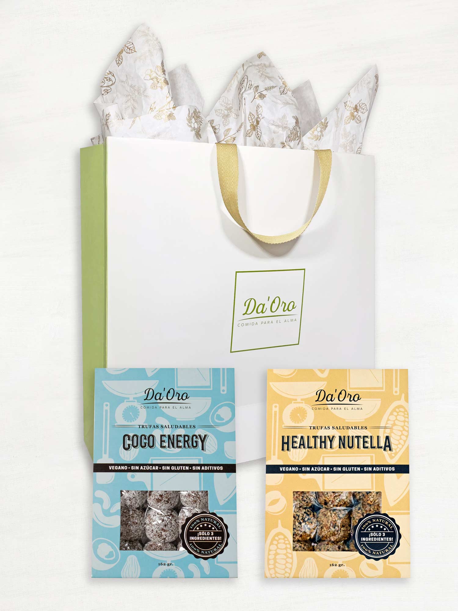 Bolsa de regalo marca Da'Oro con una caja de trufa healthy nutella y una caja de trufa coco energy