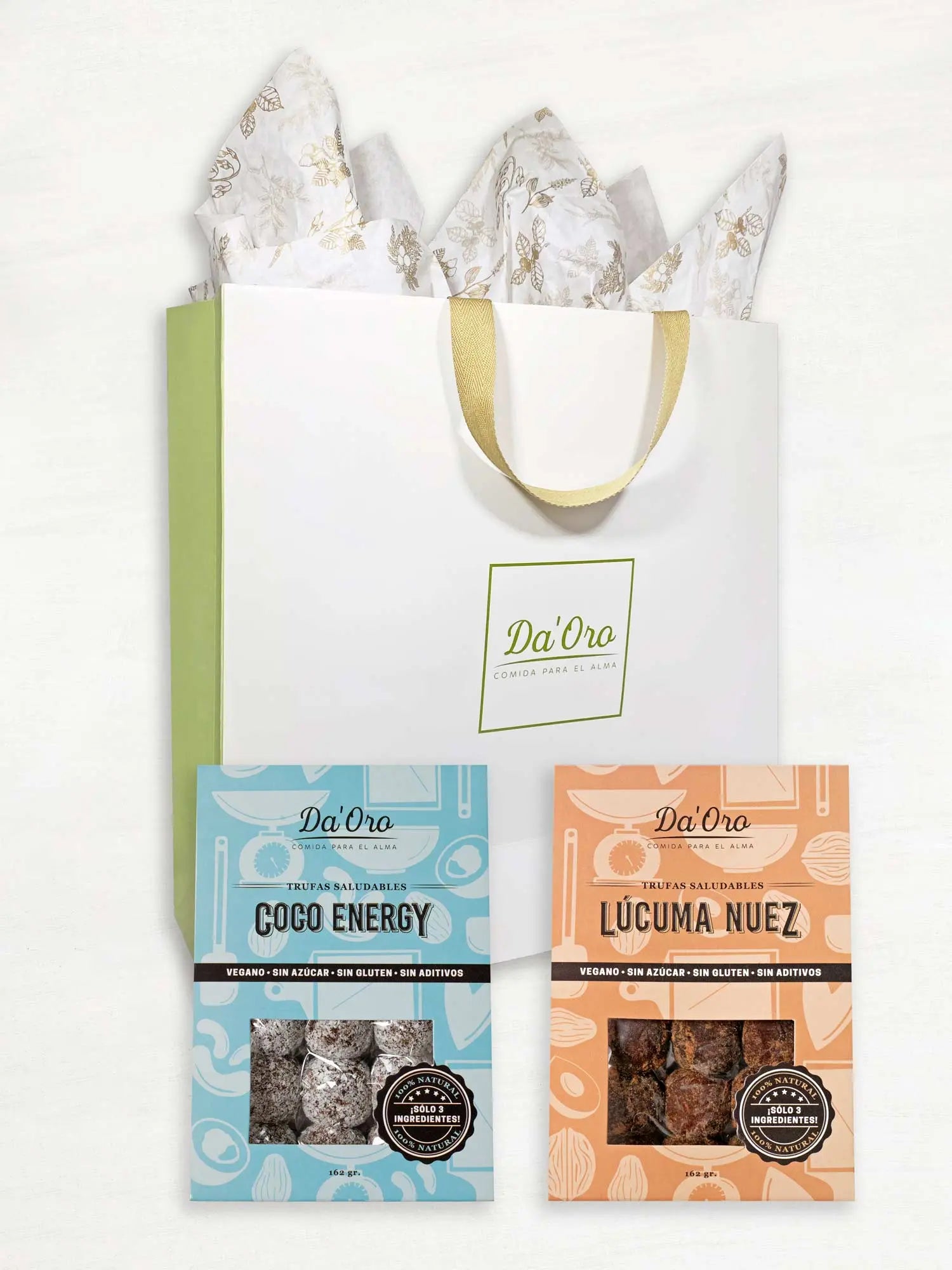 Bolsa de regalo marca Da'Oro con una caja de trufa coco energy y una caja de trufa lúcuma nuez