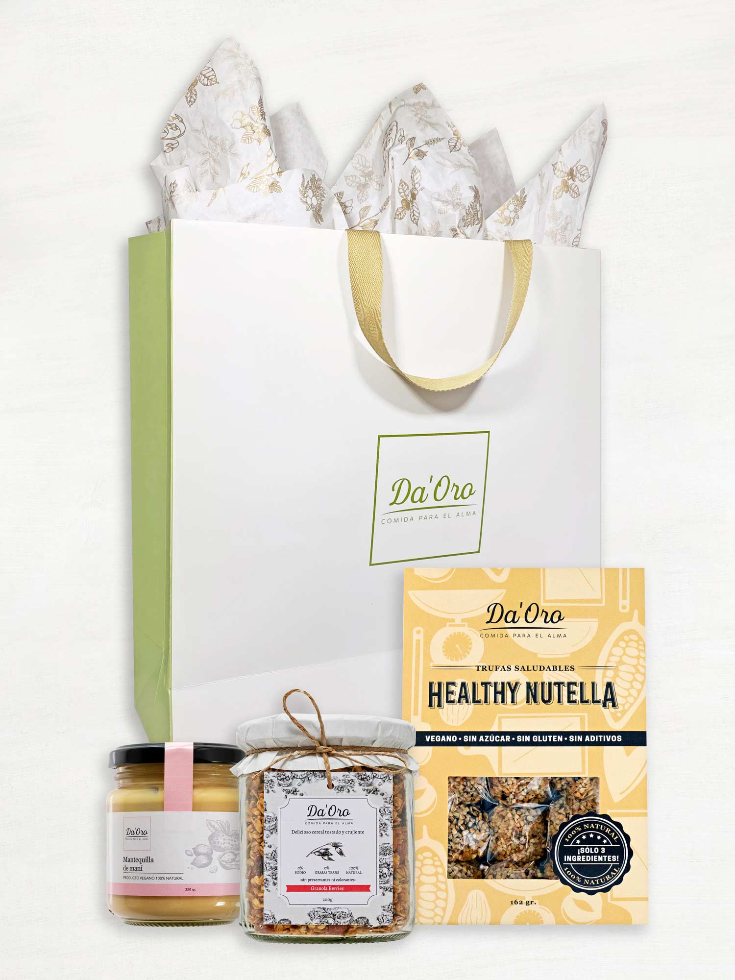 Bolsa de regalo marca Da'Oro con frasco de mantequilla de maní, frasco de granola y caja de trufas healthy nutella