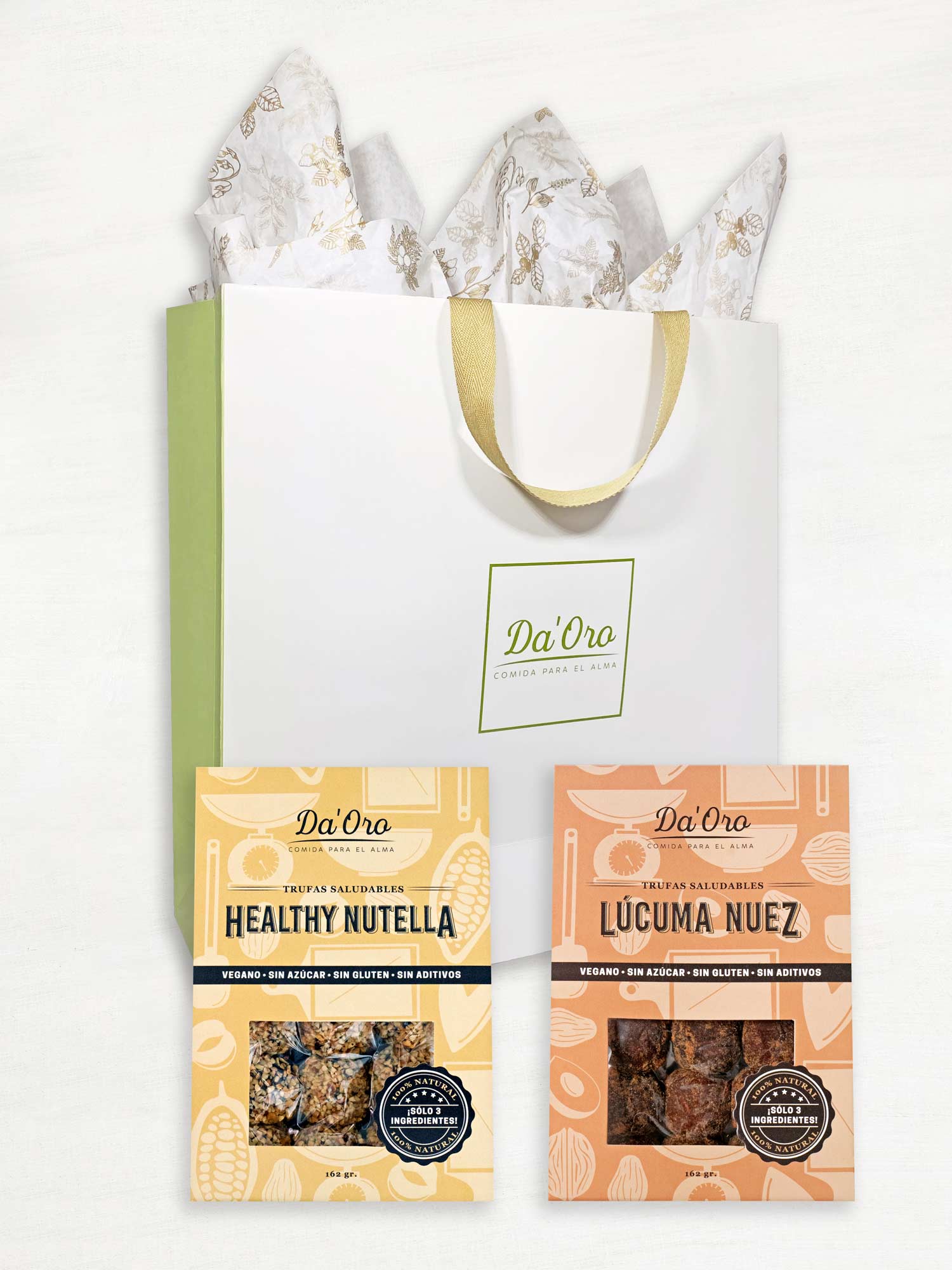 Bolsa de regalo marca Da'Oro con una caja de trufa healthy nutella y una caja de trufa lúcuma nuez